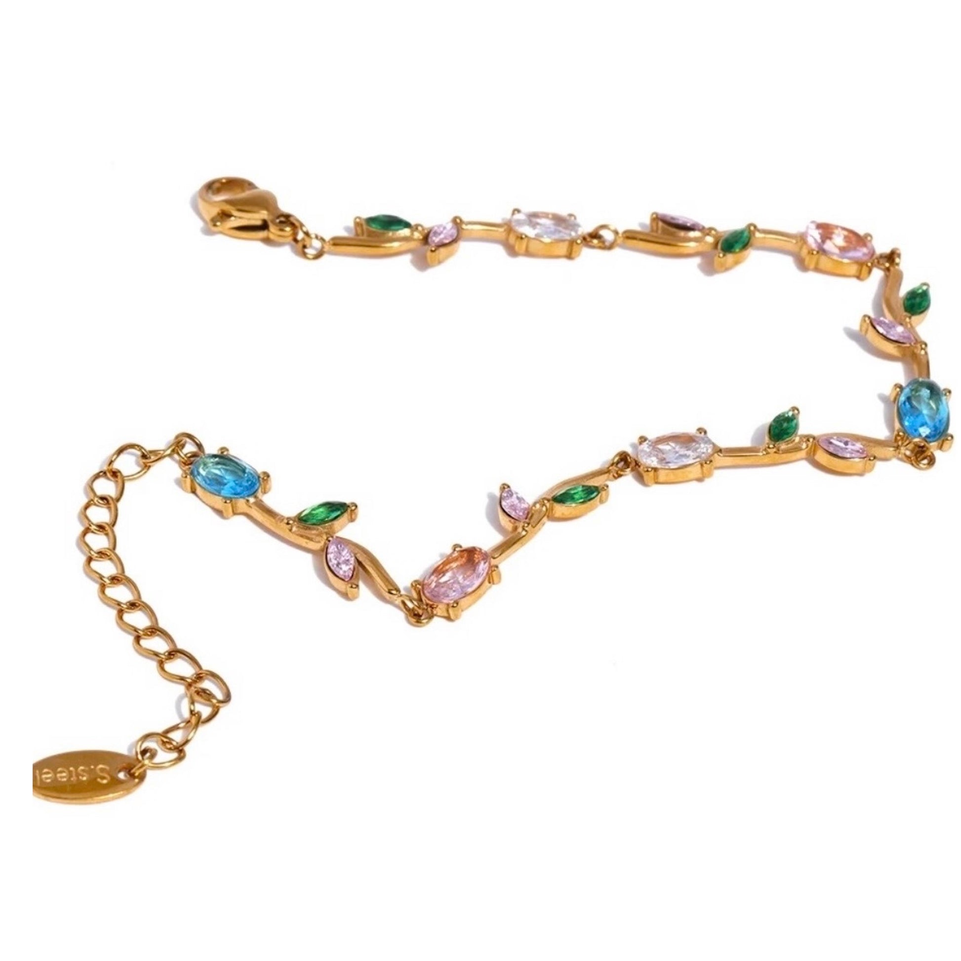 Bracelet fin doré en acier inoxydable serti de zirconiums multicolores, bijou raffiné pour femme.