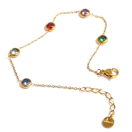 Bracelet fin doré en acier inoxydable avec pampilles pierres colorées, bijou délicat et tendance pour femme.