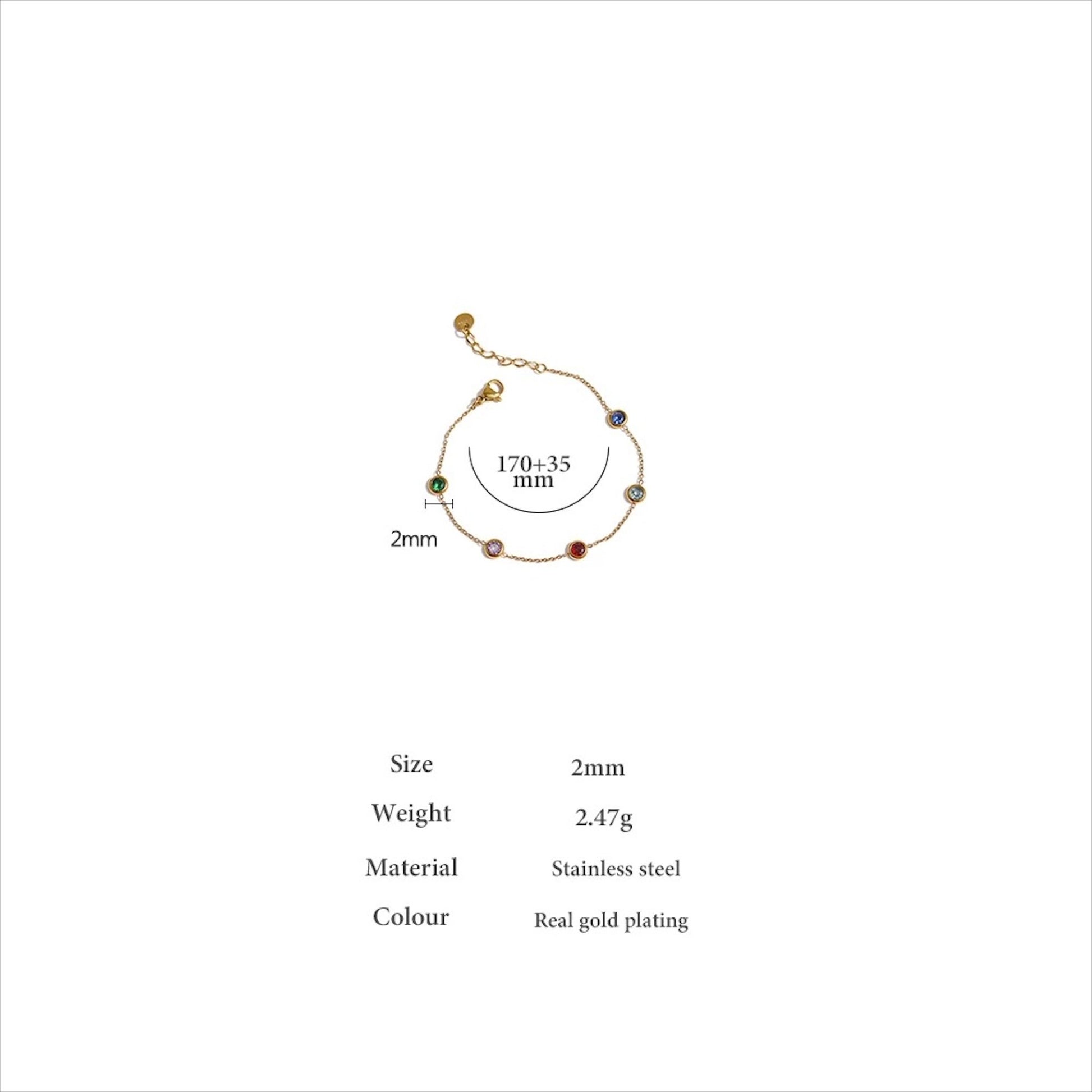 Bracelet fin doré en acier inoxydable avec pampilles pierres colorées, bijou délicat et tendance pour femme.